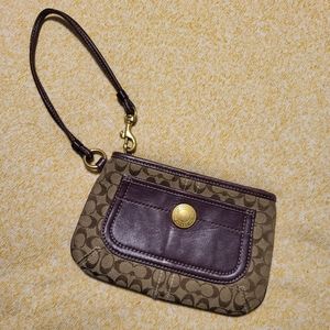 Coach Wristlet in plum and tan